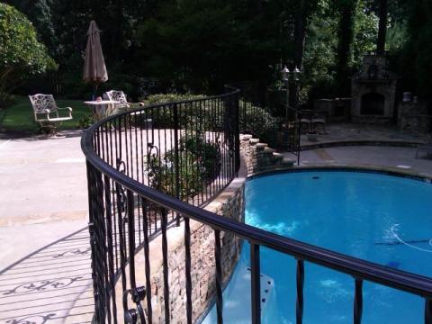 wrought iron handrails | Custom bending | with scrolls and twisted balusters | pool safety