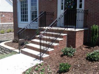 Custom wrought iron rails with baluster collars, or knuckles, and finials