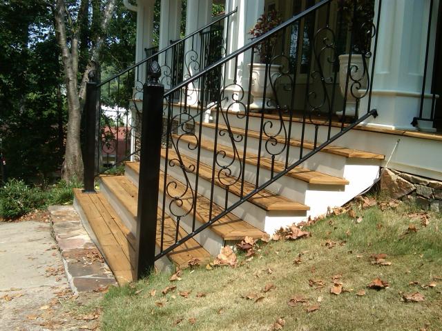 Custom wrought iron rails - scrolls, oversized post with finial topper