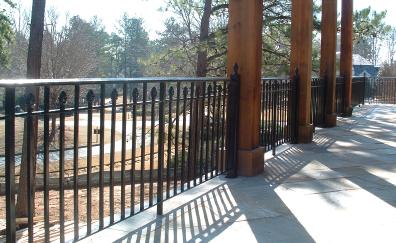 Wrought iron fences and wrought iron rails can beautifully enhance your home while providing safety and security to your property.  Minds Eye Fabrication welds all parts together.  We dont use brackets and screws except to fasten to non-weldable surfaces (steps, porches etc.)